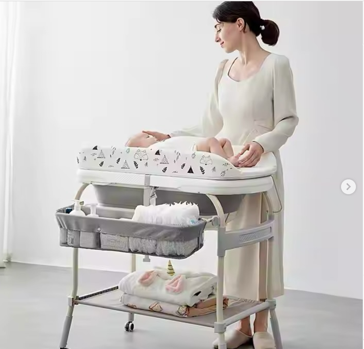 طاولة تغيير حفاضات متعددة الوظائف مع حوض استحمام من بيبي هود